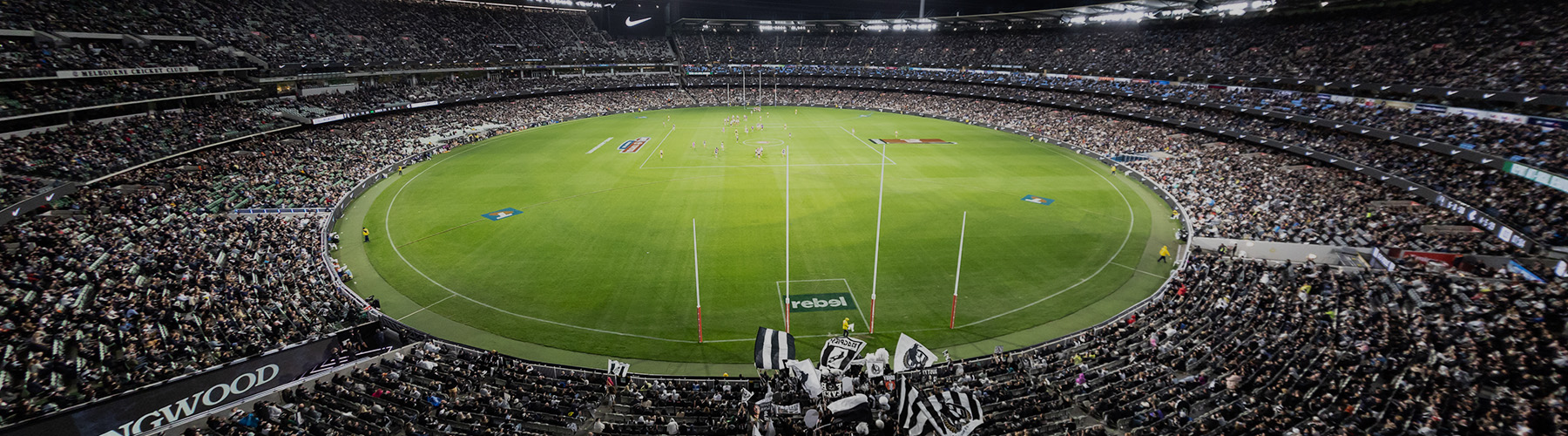 A wide shot of the MCG arena and stands at a Collingwood night match