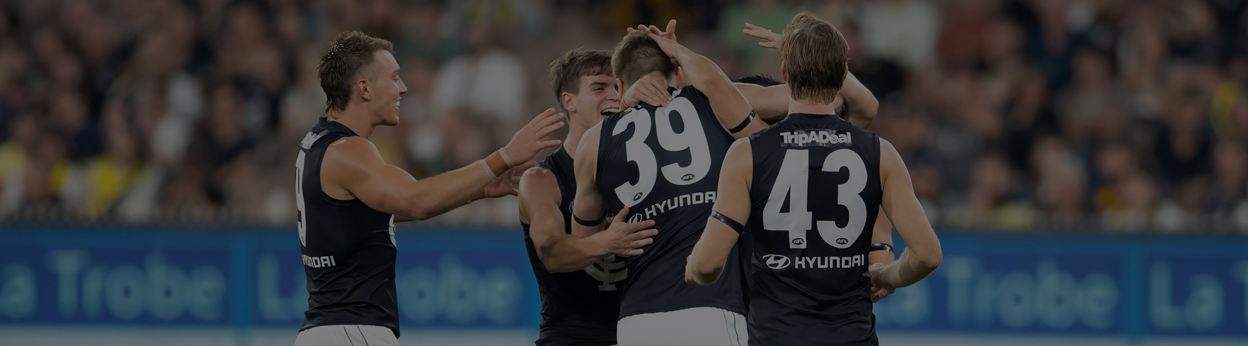 Carlton players celebrate