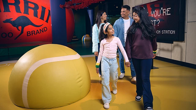 Family explores the sports museum