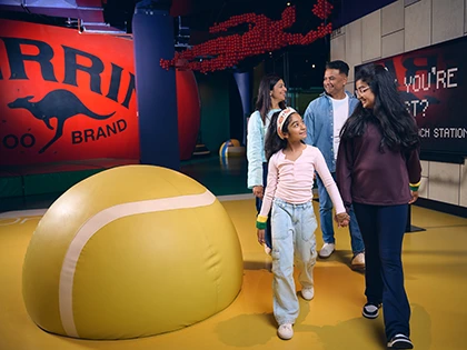 Family explores the sports museum
