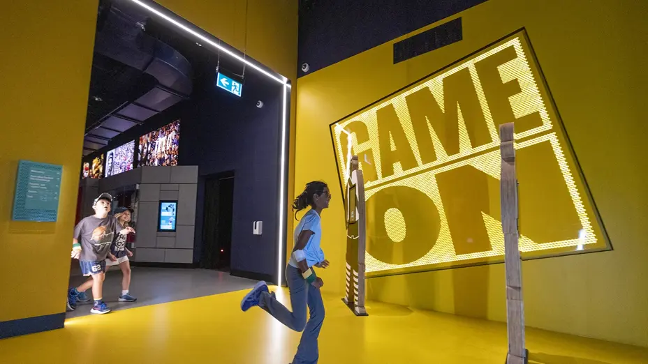 Child runs into Game On Gallery
