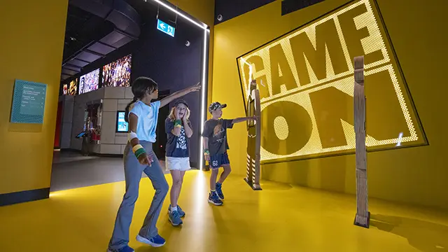 Child runs into Game On Gallery