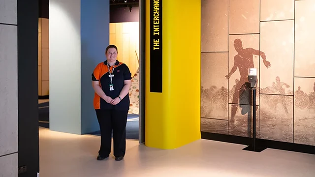 Staff member is ready to welcome visitors inside the Museum