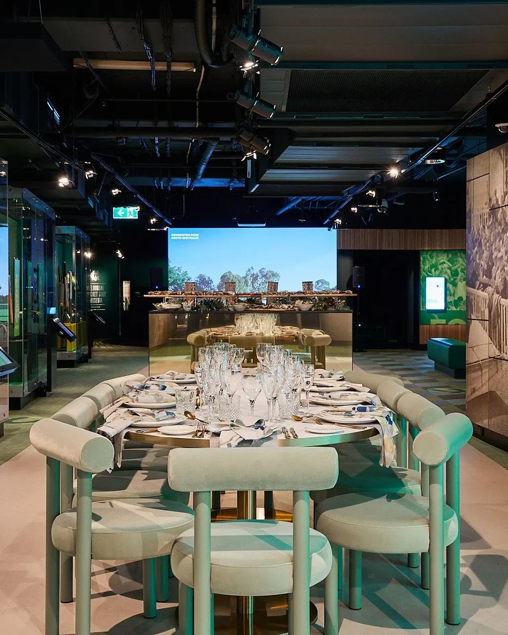 Formal dining setting in a unique museum gallery.