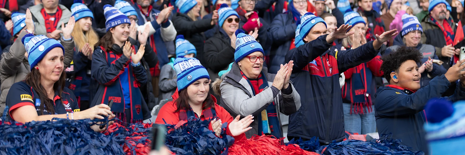 Melbourne fans in Big Freeze beanies at the G