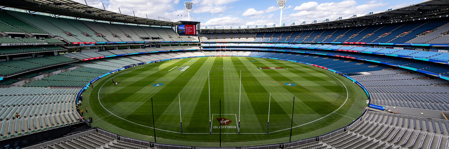 Stadium view of the MCG behind the AFL goalposts