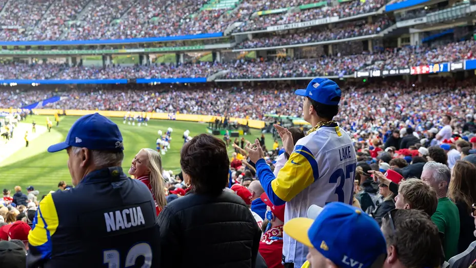 Fans in the MCG stands watching the NFL Melbourne Game