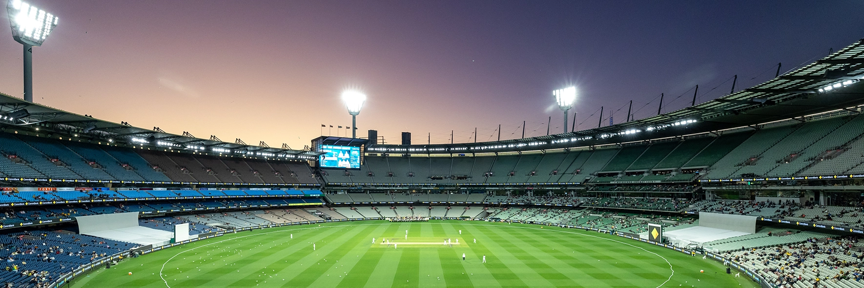 Sunset over the MCG arena during a cricket match