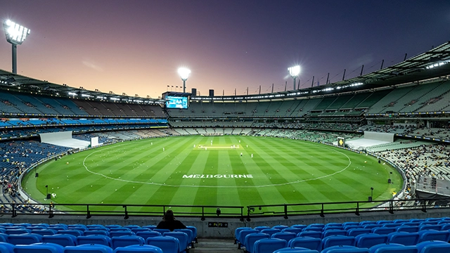 Sunset over the MCG arena during a cricket match Sunset over the MCG arena during a cricket match