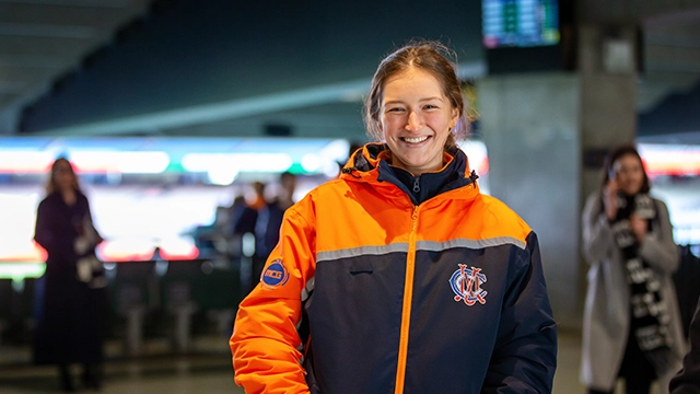 An MCG staff member working in the Members' Reserve during a match
