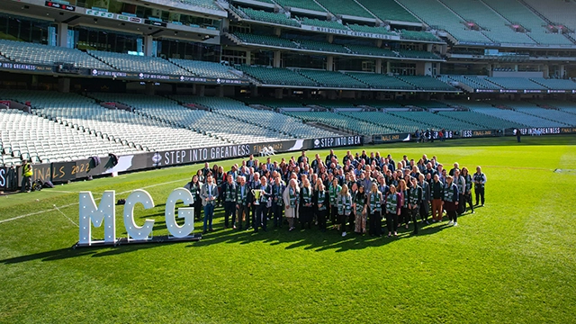 MCG permanent staff stand on the MCG arena