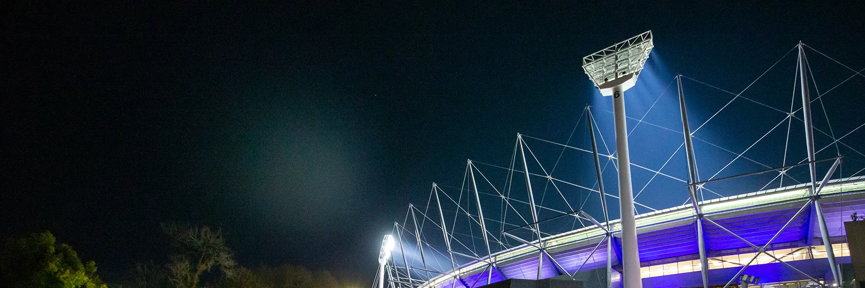 AFL22FINALS_GEELvCOLL_278_MCGLightTowers_PageBanner_Desktop.webp