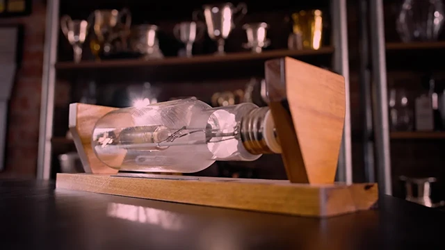 Vintage lightglobe mounted on a timber display